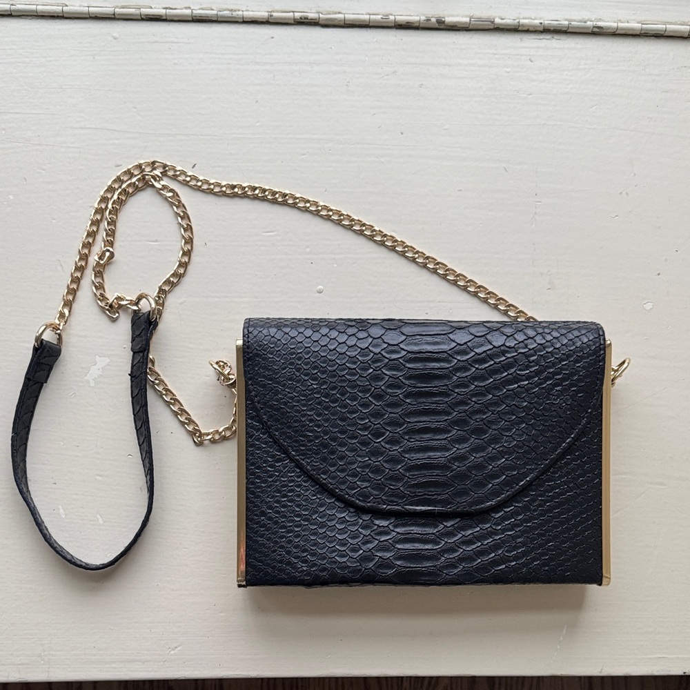Black Snake-Embossed Clutch with Gold Chain